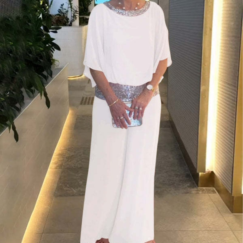 Elegancki dwuczęściowy komplet składający się z topu i spodni dla kobiet z cekinowymi detalami